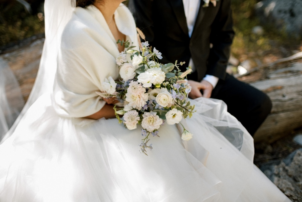 Bride,In,Big,White,Lace,Traditional,Wedding,Dress,Holding,White